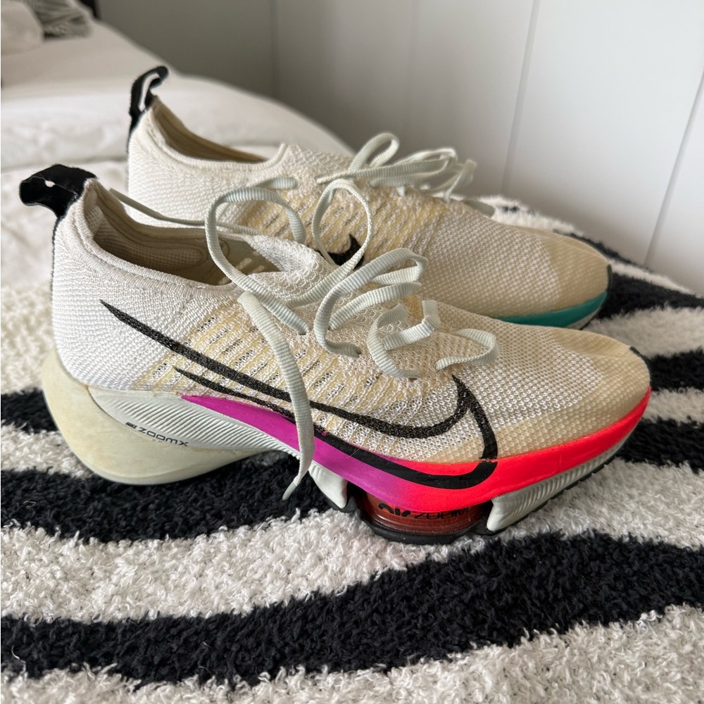 Nike Women’s White Flyknit Running Shoes with Pink and Teal Accents - Size W 6